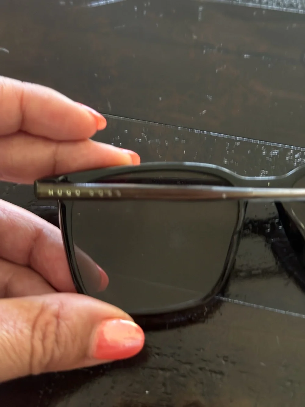 Hugo Boss Black Frame Sunglasses with Dark Lenses